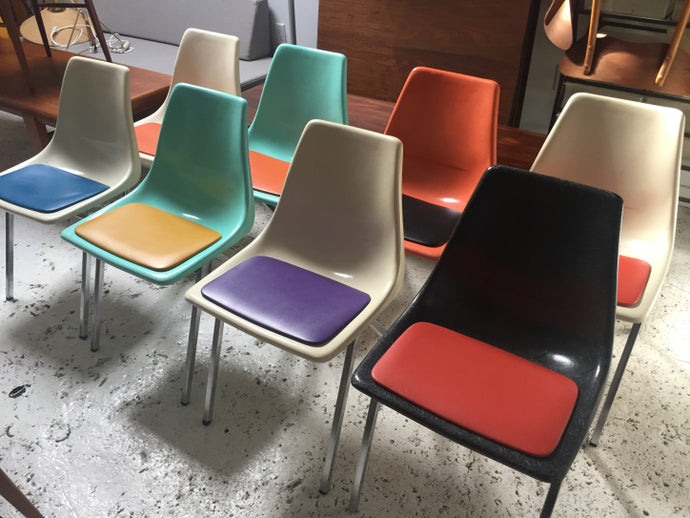 8 Fibreglass and Vinyl dining chairs.