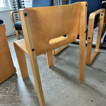 Muller & Stewart Stacking Chairs