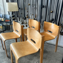 Muller & Stewart Stacking Chairs